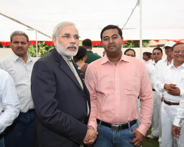 Coach Hardiksinh Rajput being felicitated at a state sports event