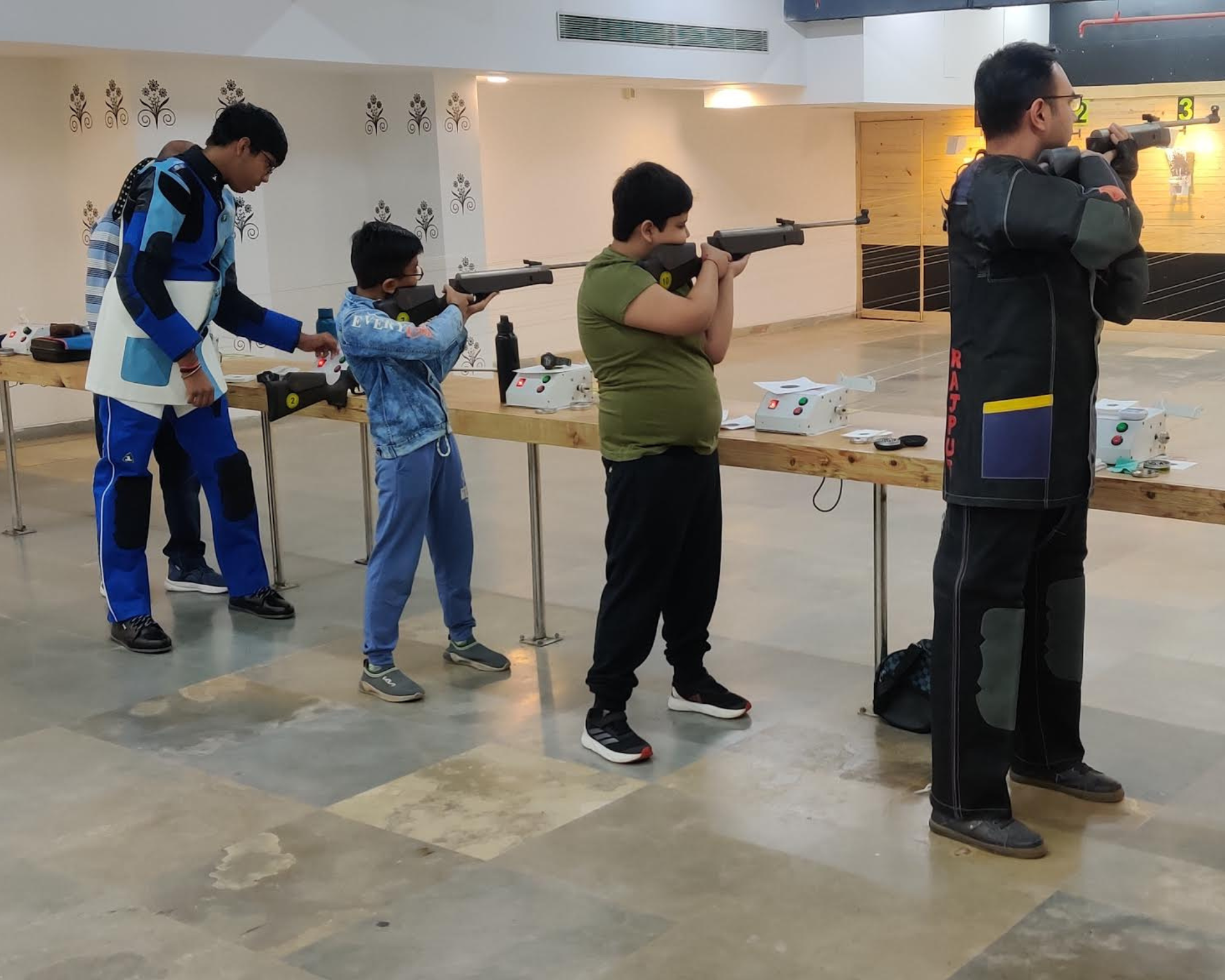 Shooters on the firing line at Rajput Shooting & Sports Academy
