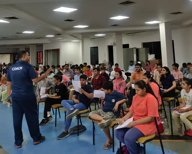 Coach Hardiksinh Rajput briefing a school workshop